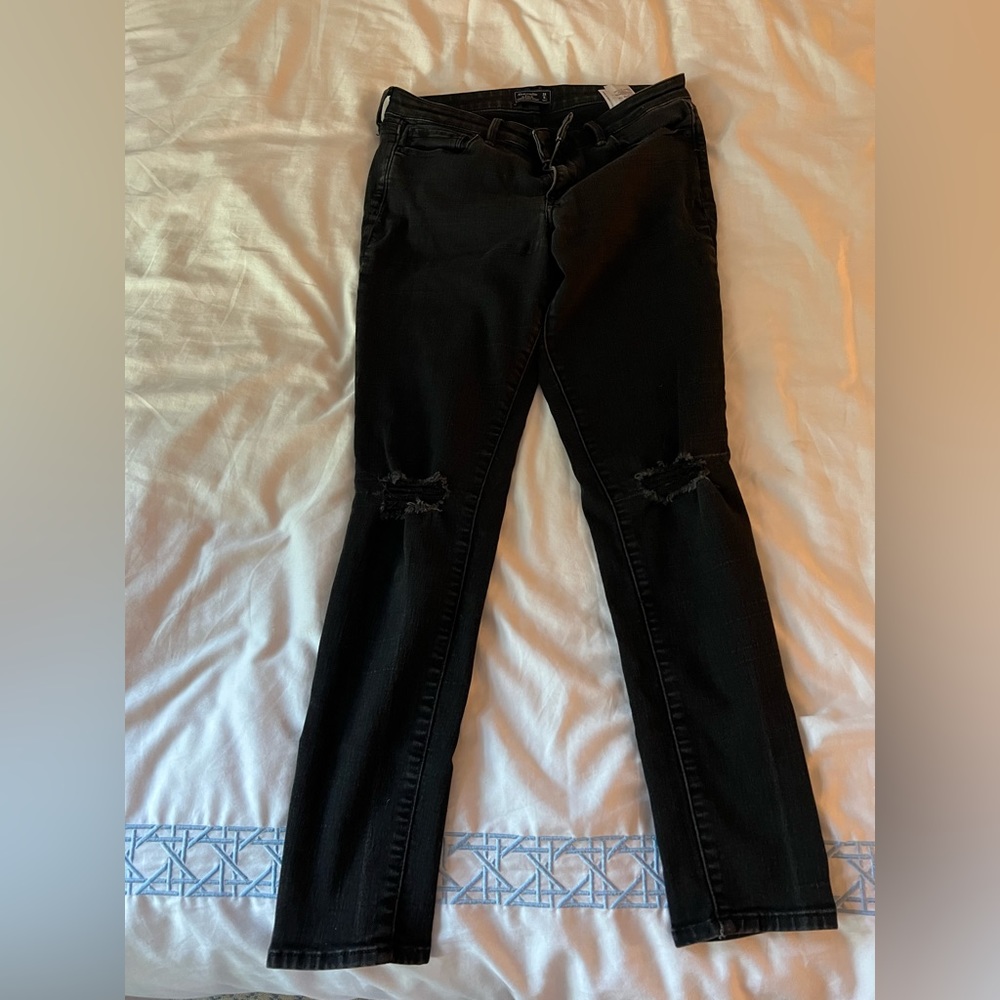 Ripped black skinny jeans